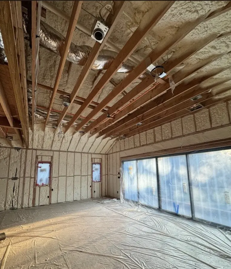 Interior walls and ceiling insulated with spray foam during new construction in St. Pete Beach